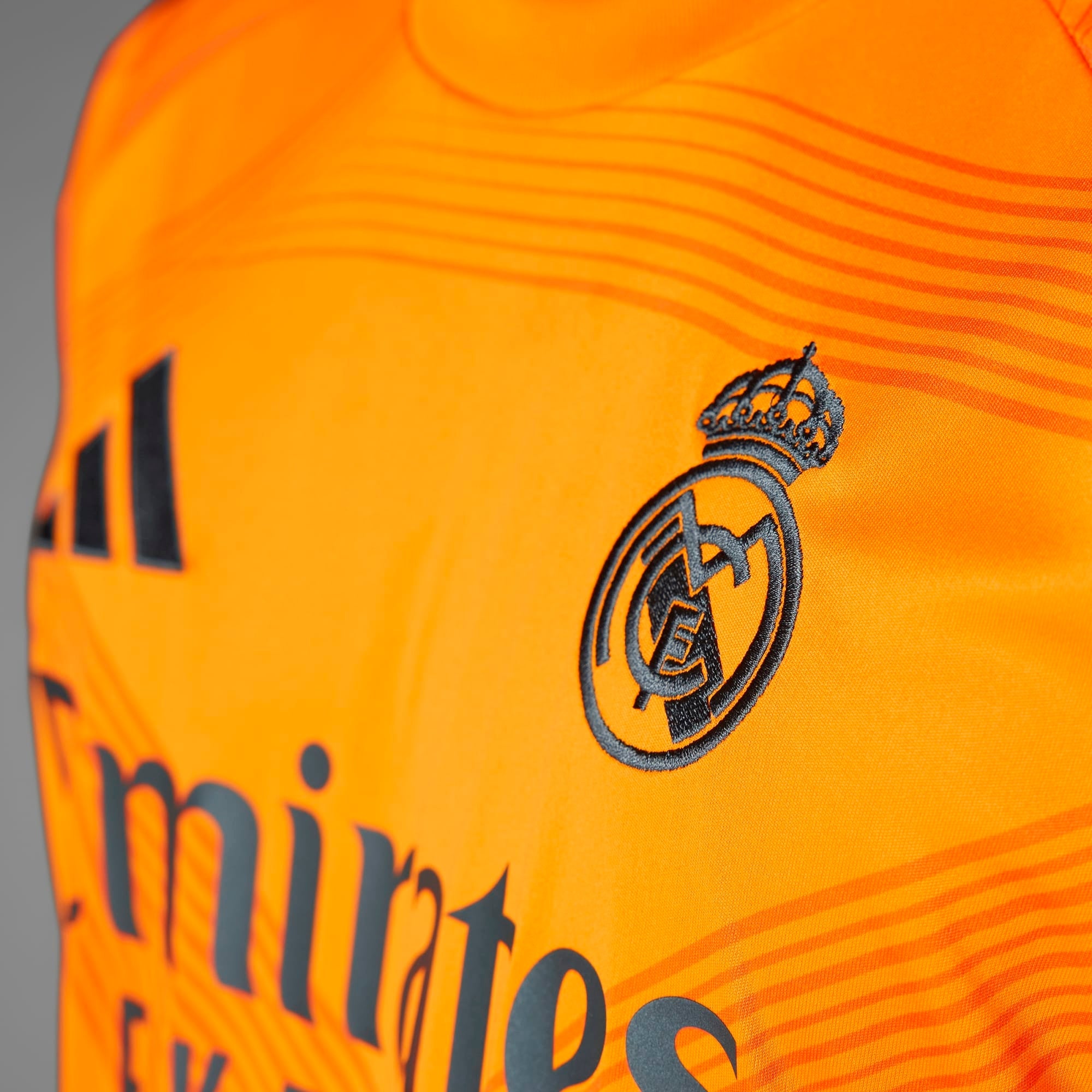 adidas Real Madrid 2024/25 Stadium Away Men's AEROREADY Soccer Replica Jersey - Crew Orange
