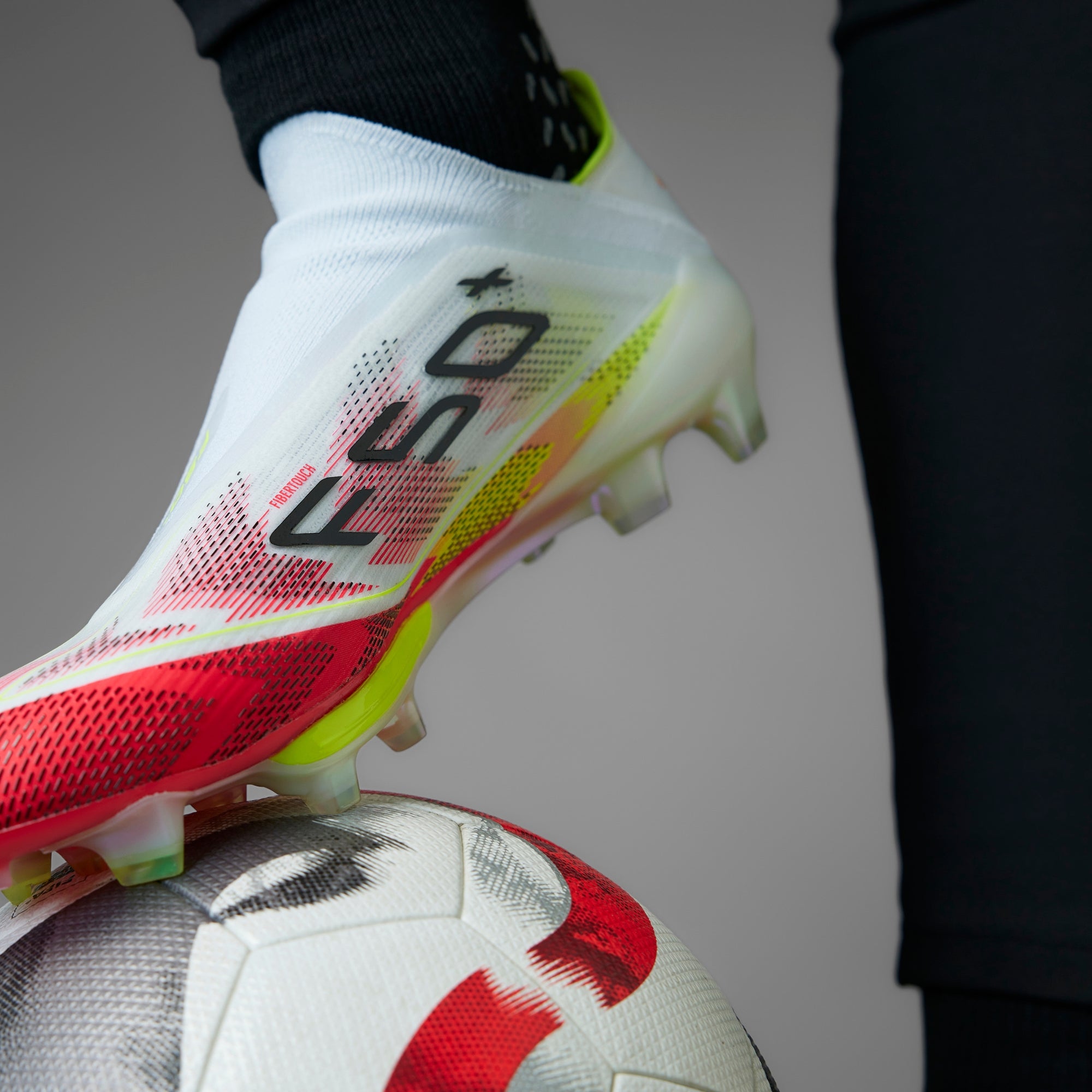 adidas F50+ FG Low-Top Soccer Cleats - Cloud White / Core Black / Solar Yellow