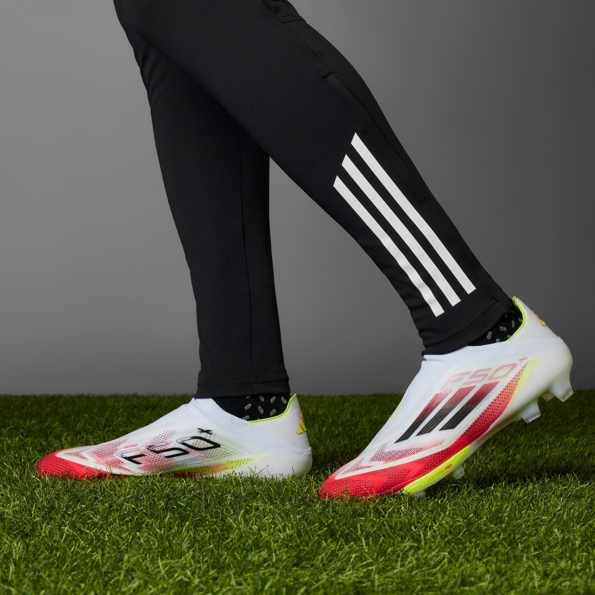 adidas F50+ FG Low-Top Soccer Cleats - Cloud White / Core Black / Solar Yellow