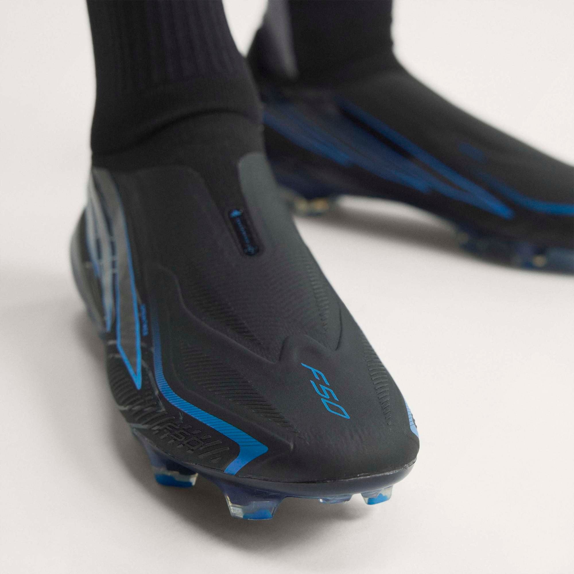 adidas F50 Hyperfast Elite Laceless Firm-Ground Low-Top Soccer Cleats - Core Black / Core Black / Lucid Ray Blue