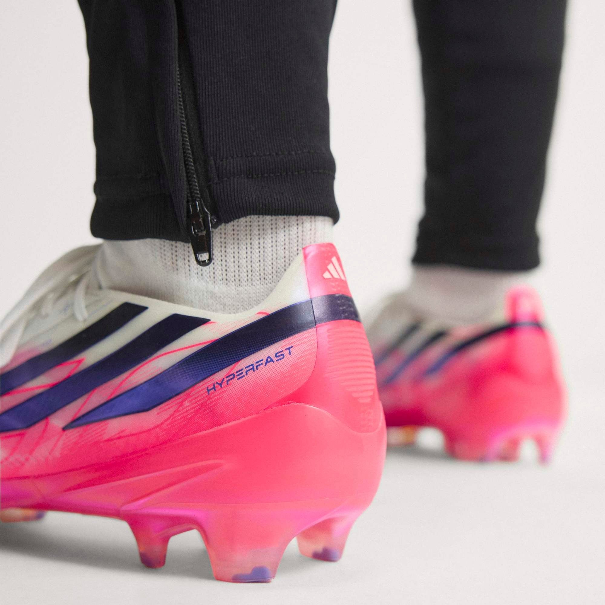 adidas F50 Hyperfast Elite Firm-Ground Low-Top Soccer Cleats - Ftwr White / Solar Purple / Solar Turbo