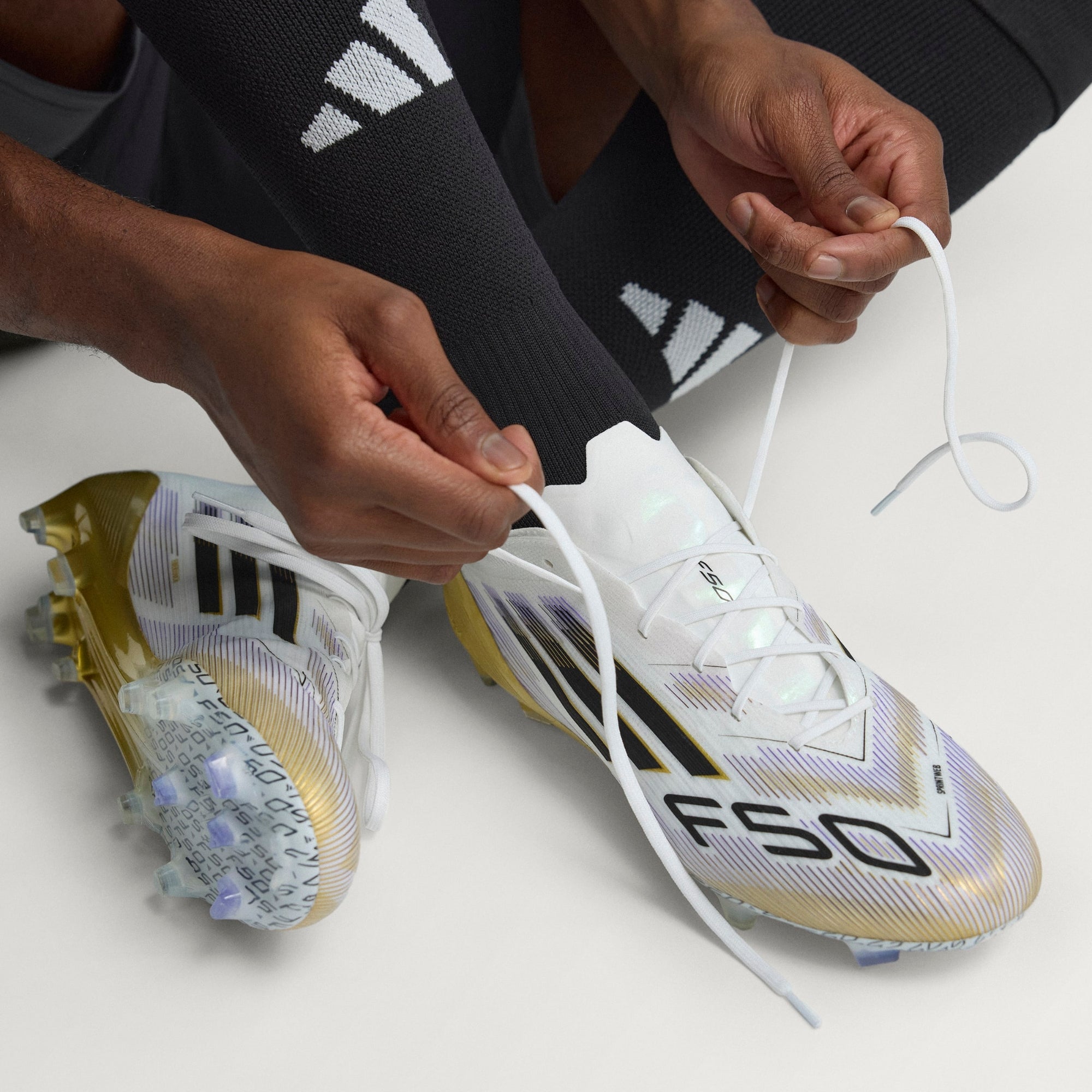 adidas F50 Elite Firm-Ground Low-Top Soccer Cleats - Cloud White / Core Black / Gold Metallic