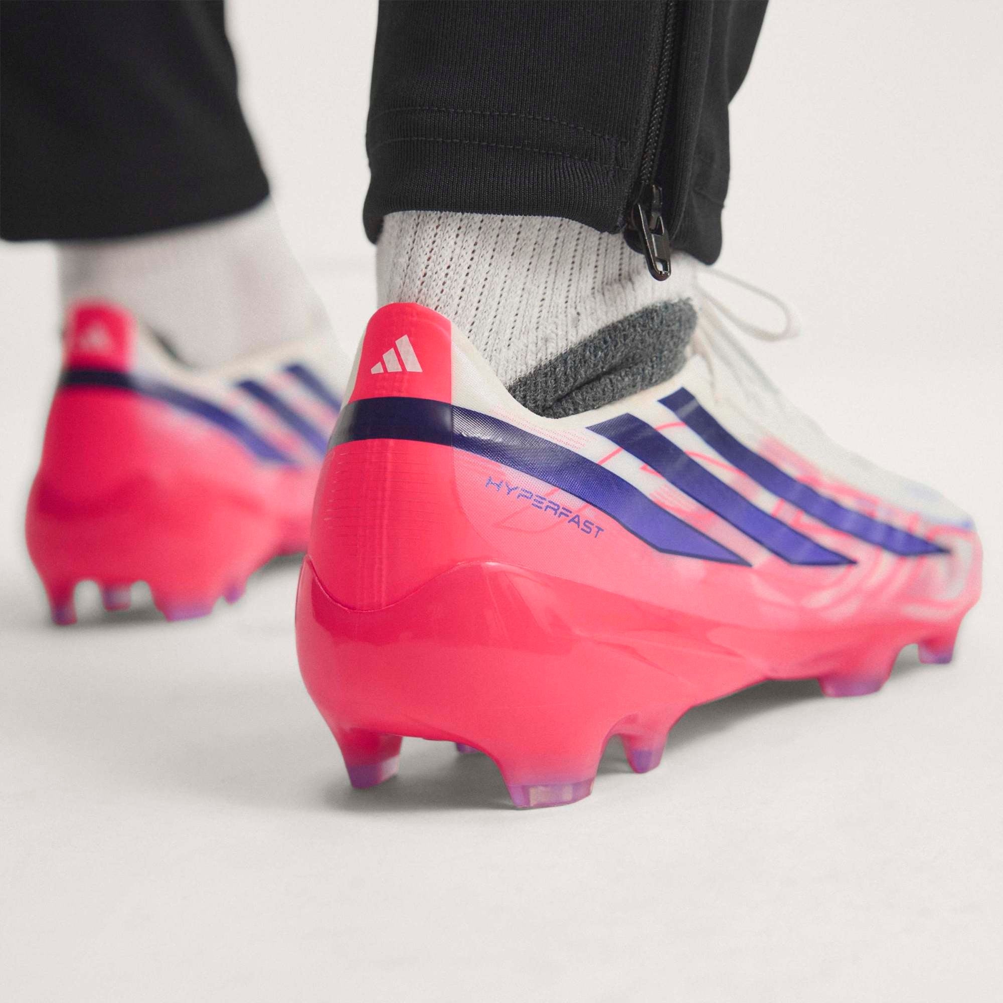 adidas F50 Hyperfast Pro Firm-Ground Low-Top Soccer Cleats - Ftwr White / Solar Purple / Solar Turbo