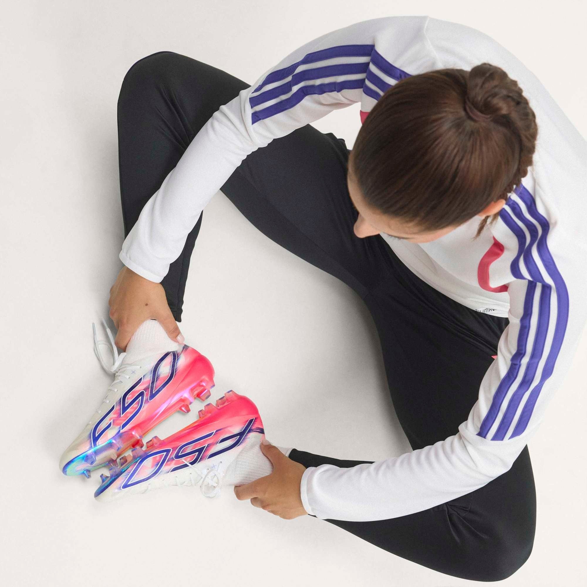adidas F50 Hyperfast EVO Firm-Ground Low-Top Soccer Cleats - Cloud White / Solar Purple / Solar Turbo