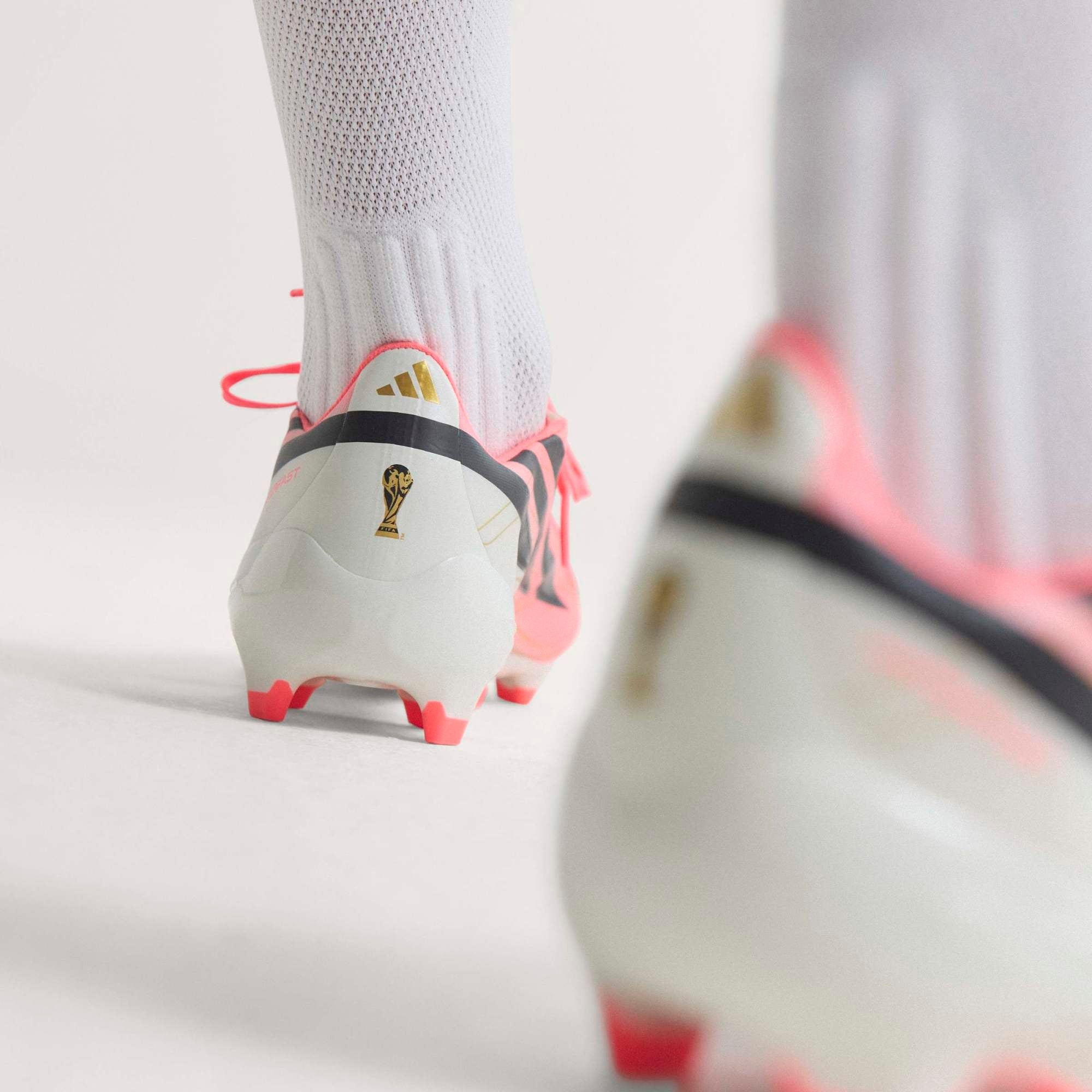 adidas F50 Hyperfast League Firm-Ground Low-Top Soccer Cleats - Solar Turbo / Core Black / Gold Met.