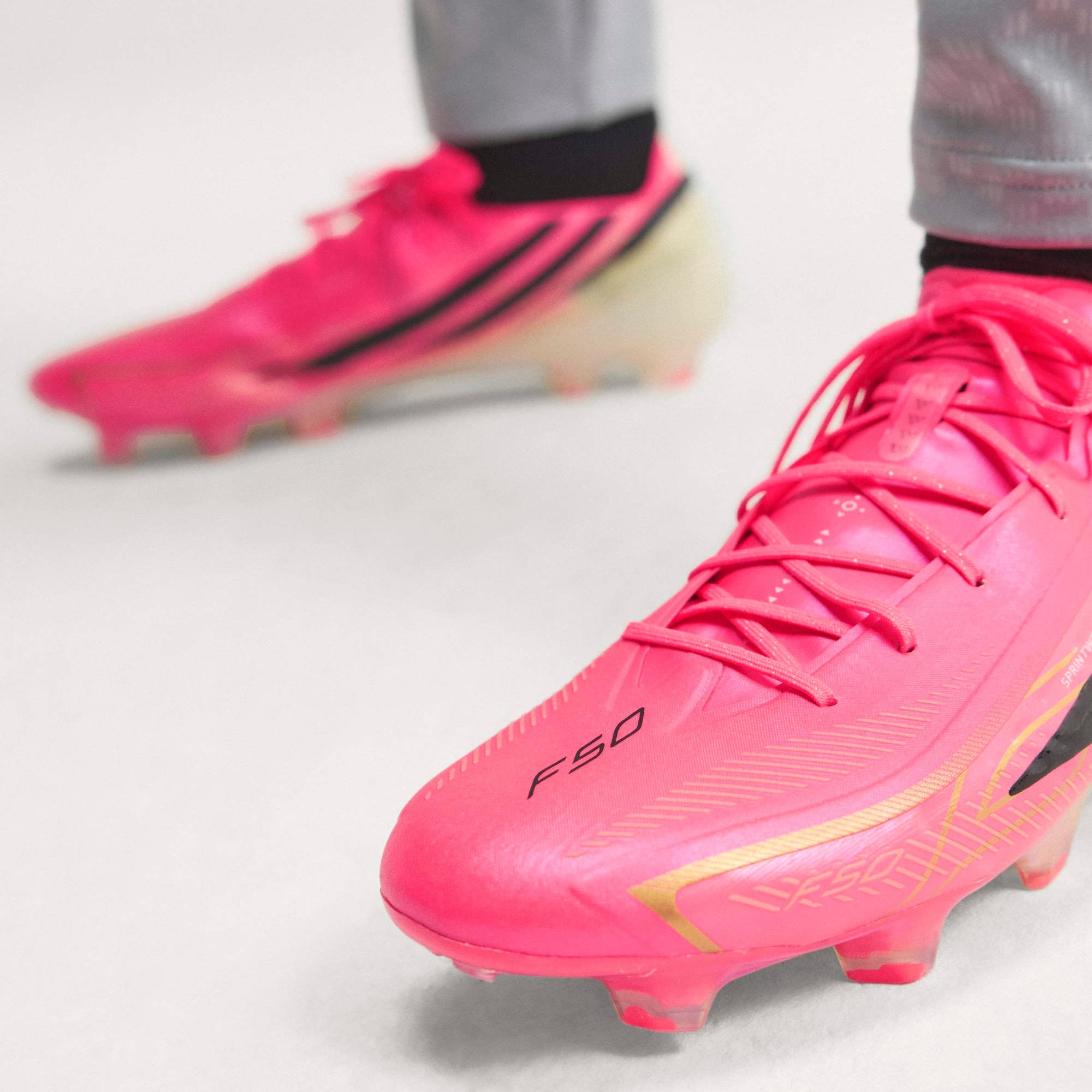 adidas F50 Hyperfast Elite Firm-Ground Low-Top Soccer Cleats - Solar Turbo / Core Black / Gold Met.