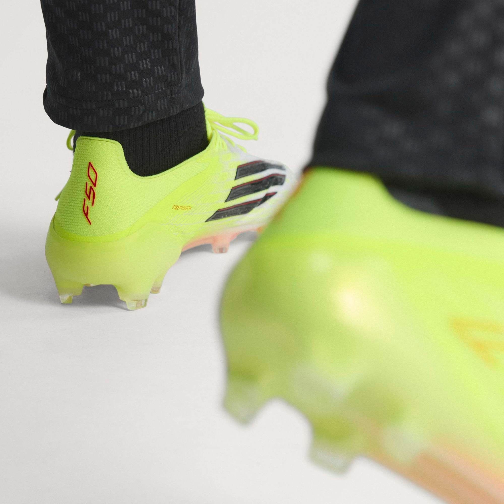adidas F50 Elite Firm-Ground Low-Top Soccer Cleats - Team Solar Yellow 2 / Core Black / Lucid Red