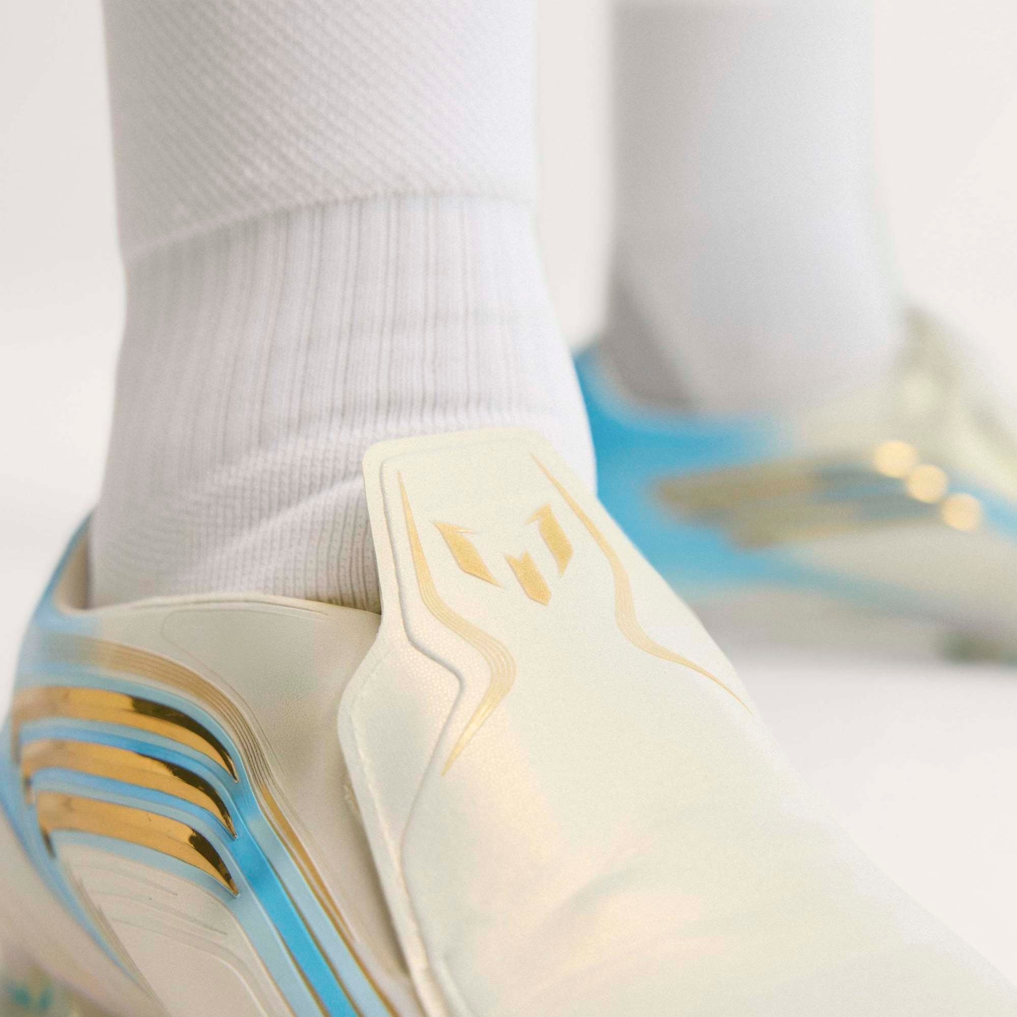 adidas F50 Messi Elite Firm-Ground Low-Top Soccer Cleats - Ivory / Semi Blue Burst / Icey Blue